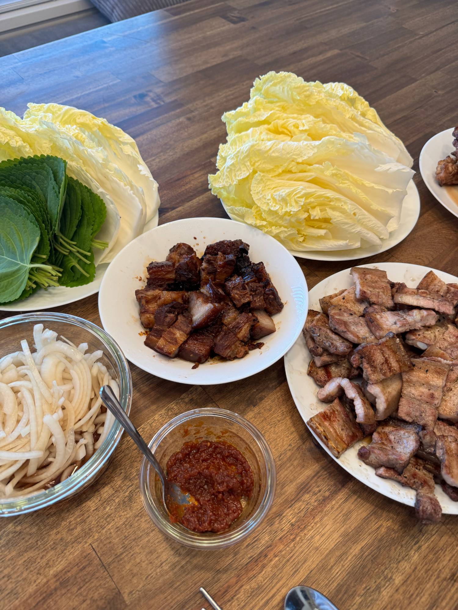 Samgyeopsal with napa cabbage and perilla leaves