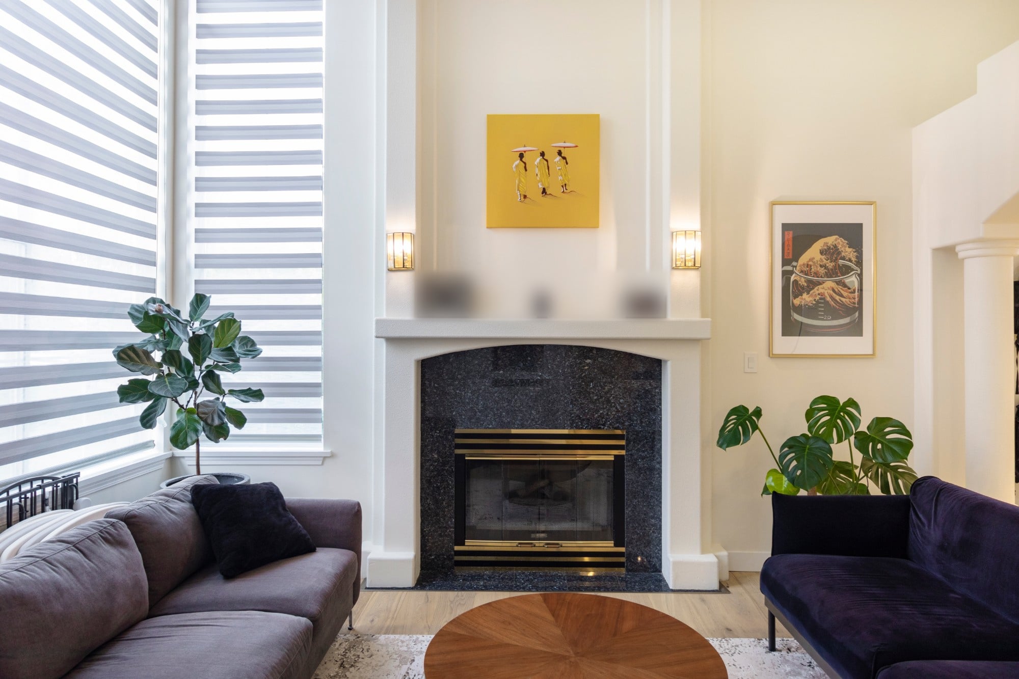 Tall windows and a fireplace for rainy days