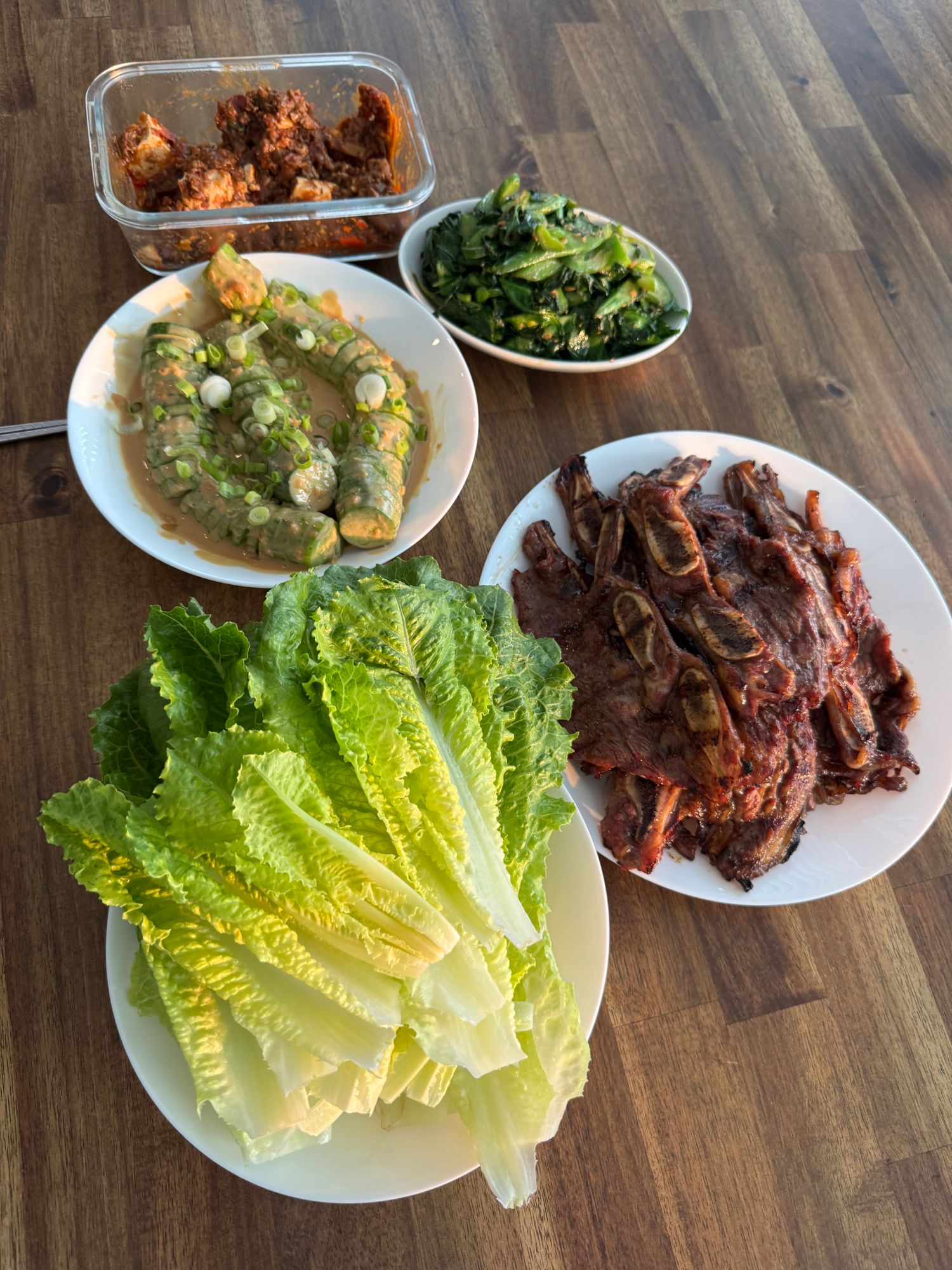 LA galbi with lettuce wraps and side dishes