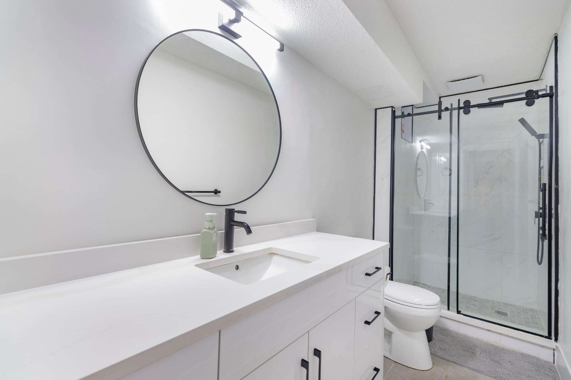 Students' bathroom with a glass walk-in shower