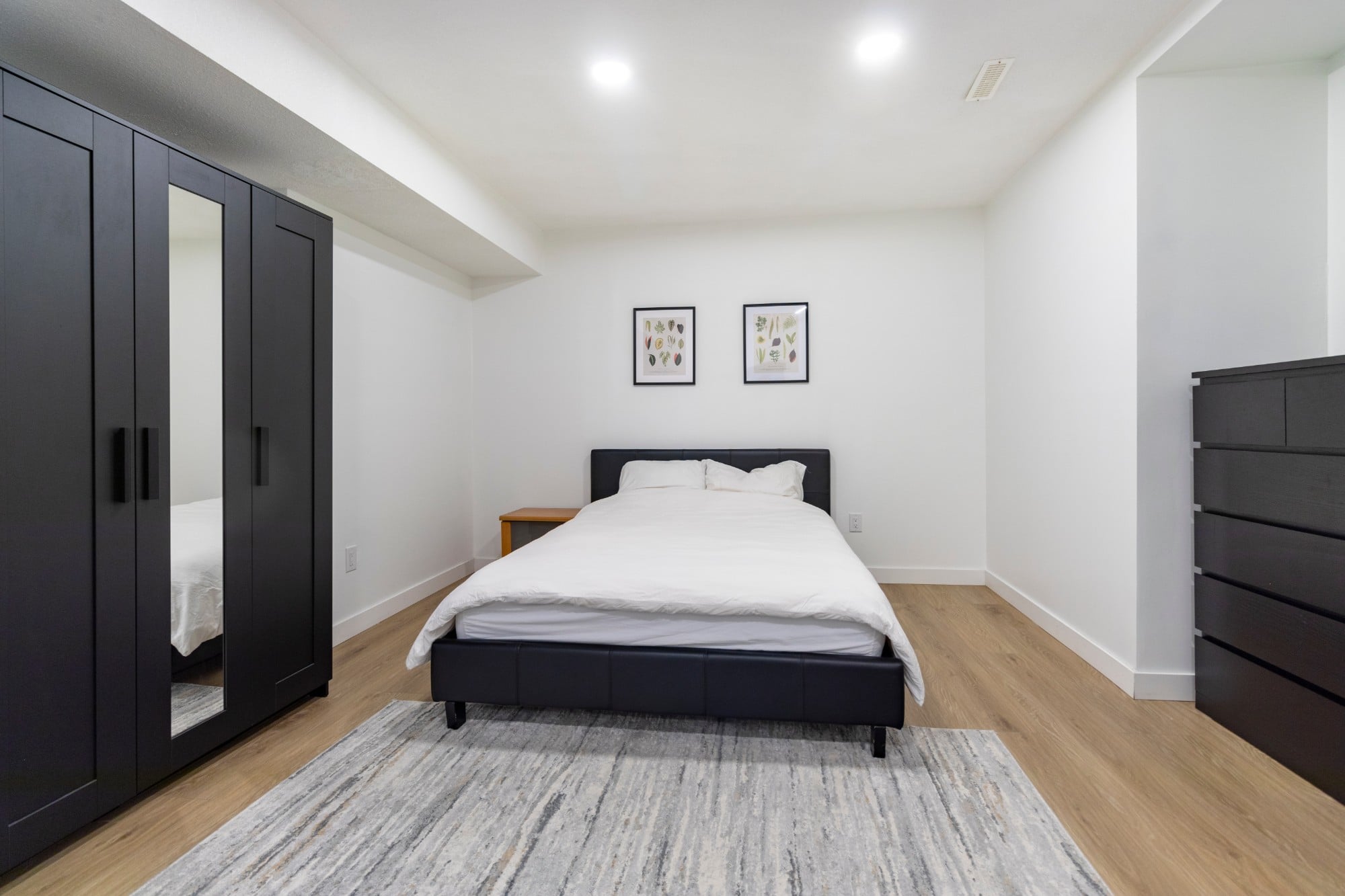 A student bedroom, with wardrobe and dresser